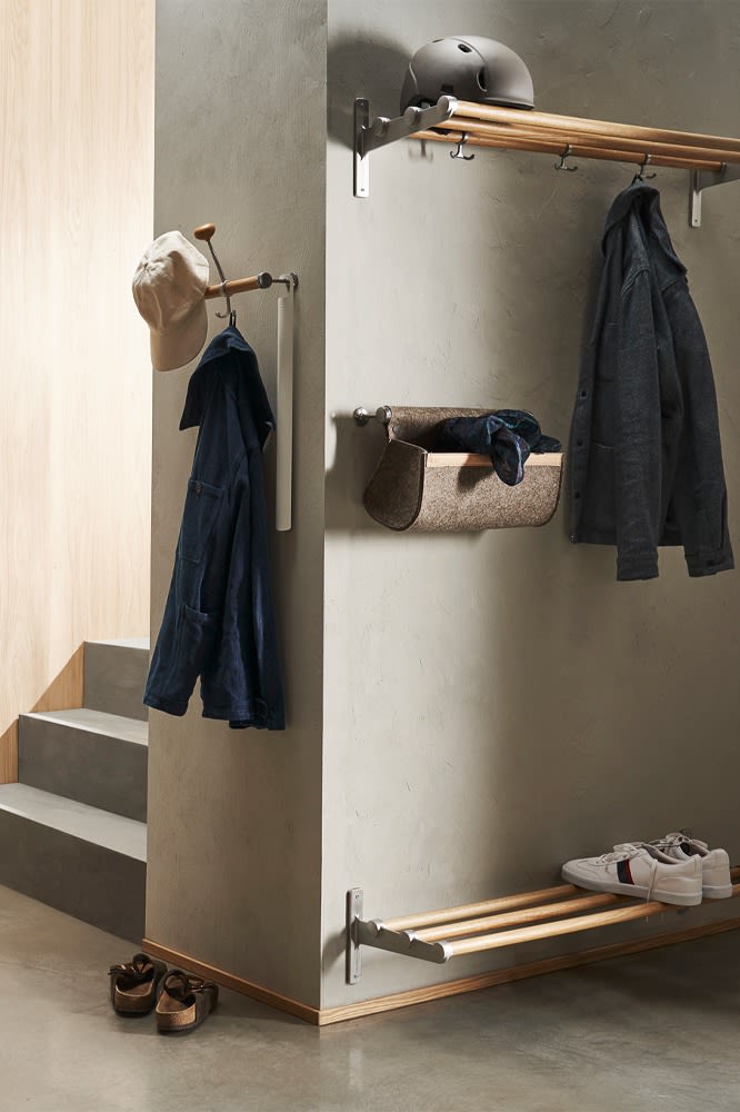 How to decorate a small hallway - inspiration from Essem Design to make the hallway more organised with an open wardrobe and combined shoe and hat rack.