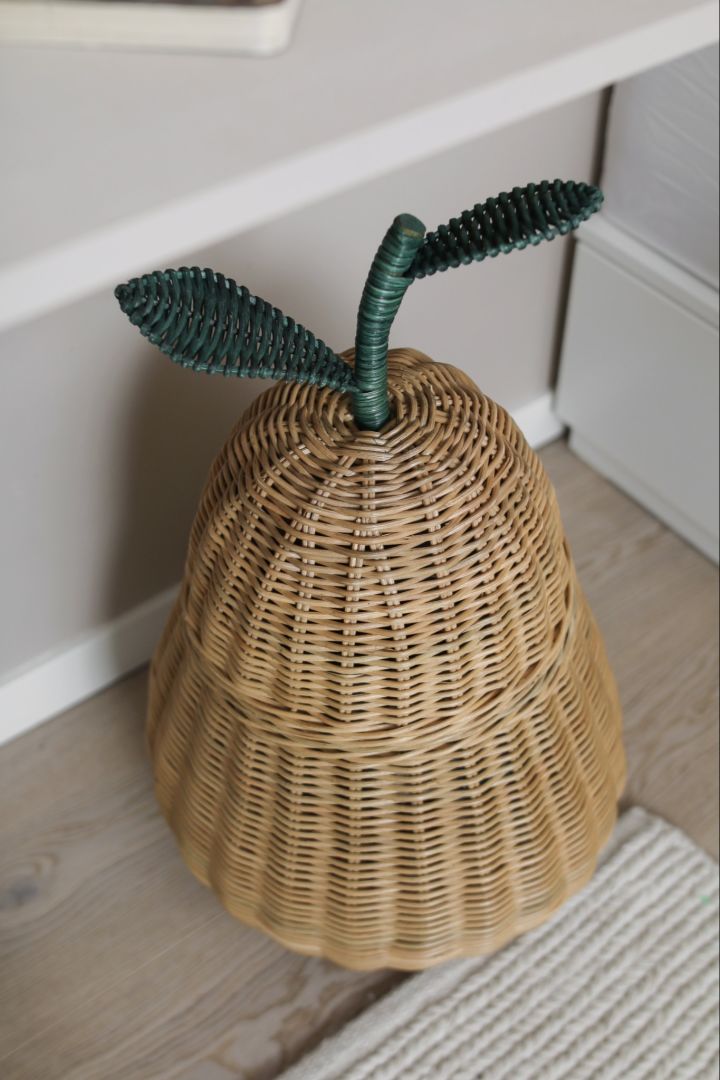 Decorate your children's room with stylish accessories like this pear shaped wicker storage basket from ferm LIVING. 