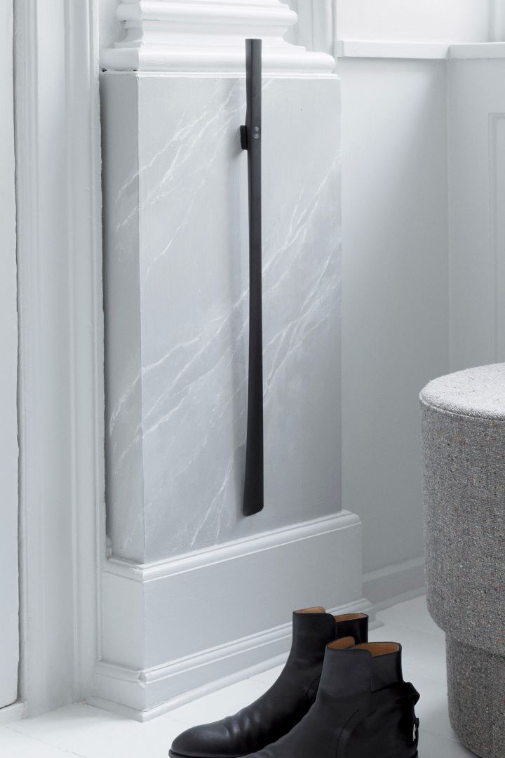 Practical home-hacks. Here you see a shoehorn attached to the wall in the entrance of a home. 