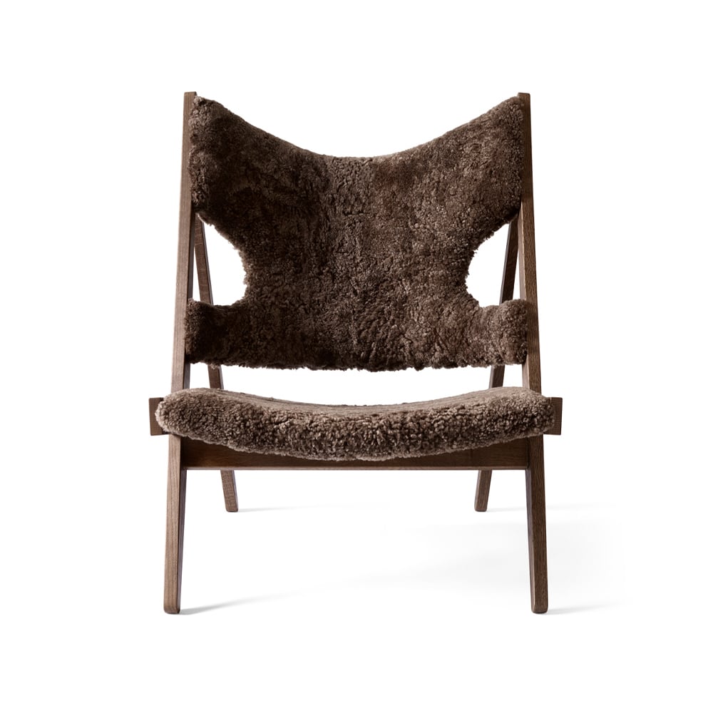 Audo Copenhagen Knitting lounge chair Sheepskin curly root dark brown, dark stained oak legs