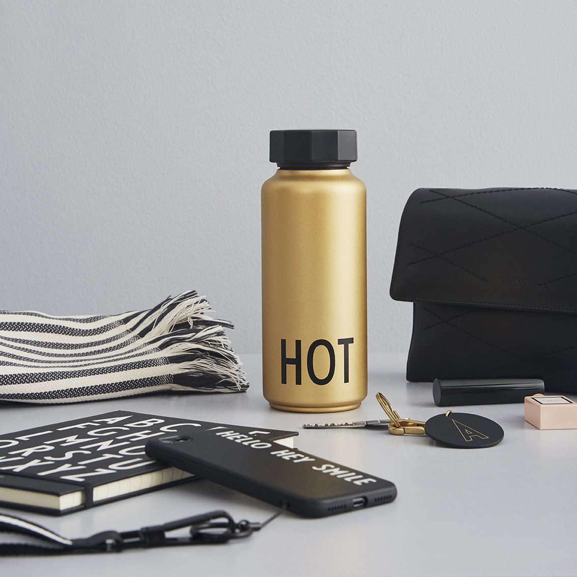 https://www.nordicnest.com/assets/blobs/design-letters-design-letters-thermos-gold/32687-05-03-76b34d49bd.jpg