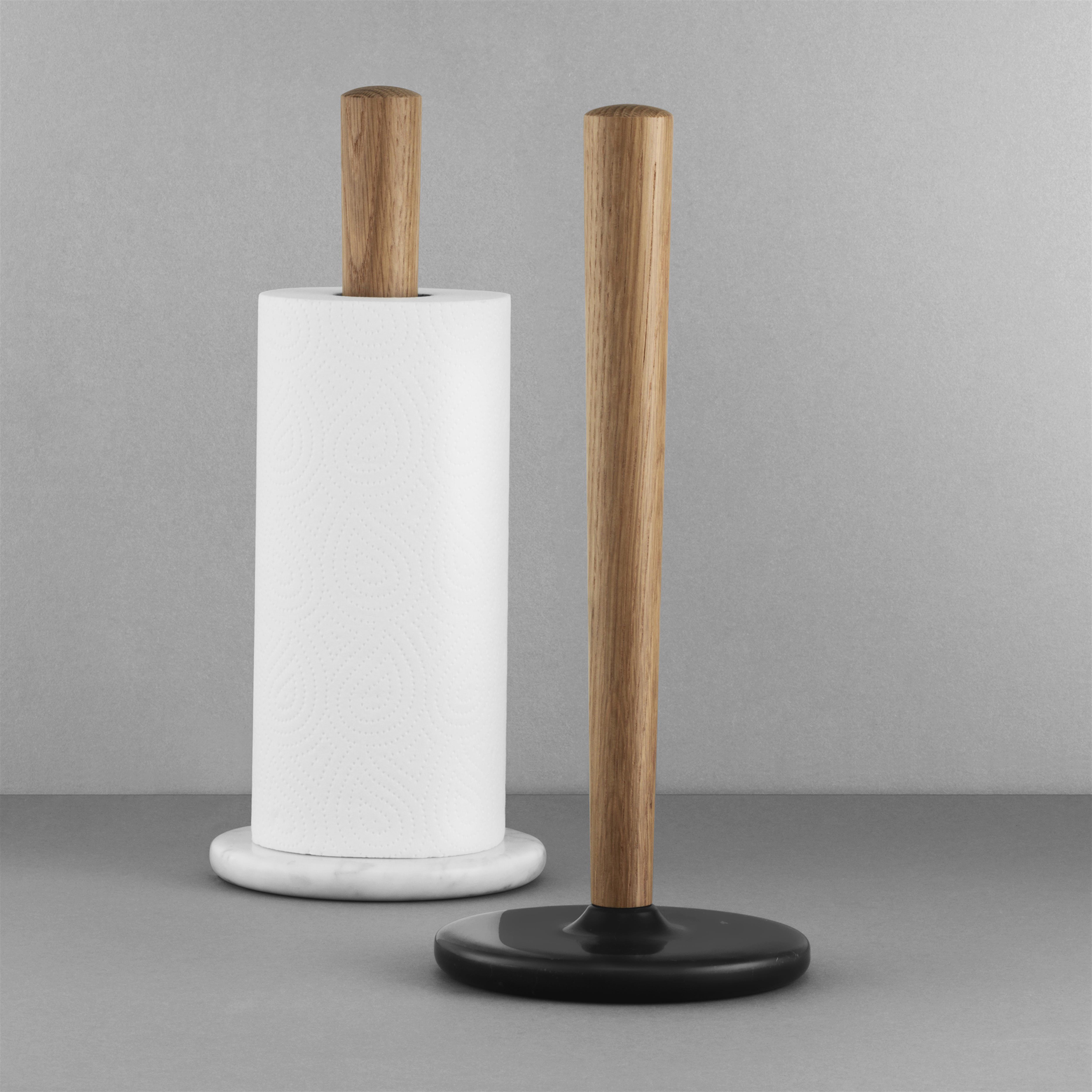 https://www.nordicnest.com/assets/blobs/normann-copenhagen-craft-kitchen-roll-holder-black-marble/p_28261-02-03-d801115eaa.jpg