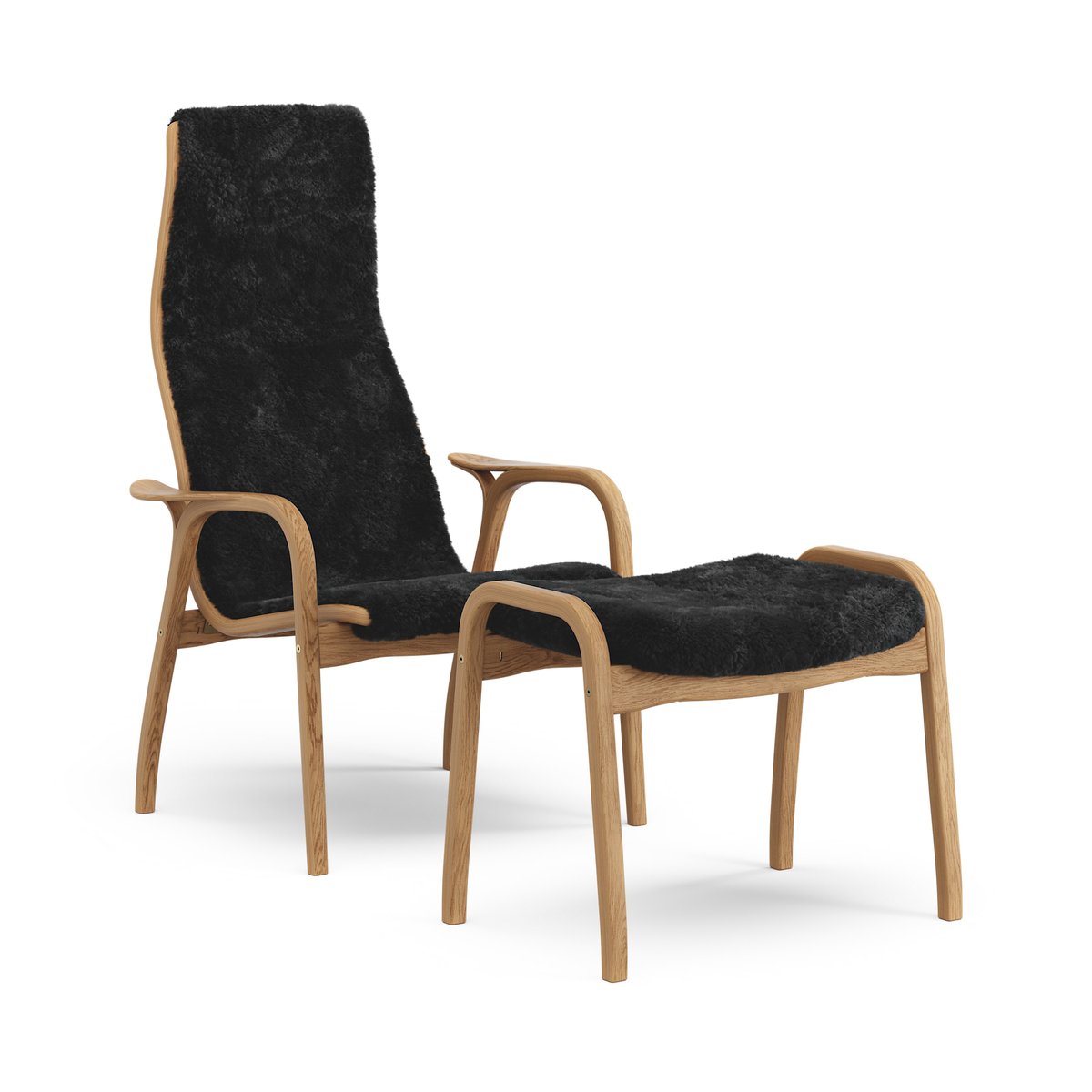 Swedese Lamino armchair and footstool oiled oak/sheepskin Black