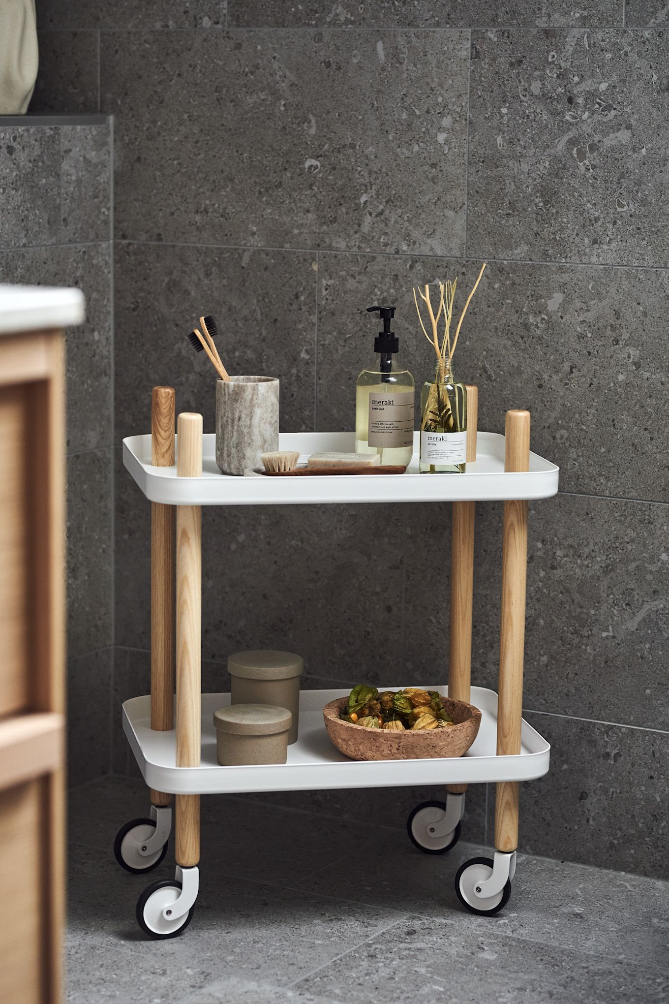 Storage ideas for small bathrooms - here you see the Block table from Normann Copenhagen, perfect for loading with items you need close to hand in your bathroom. 