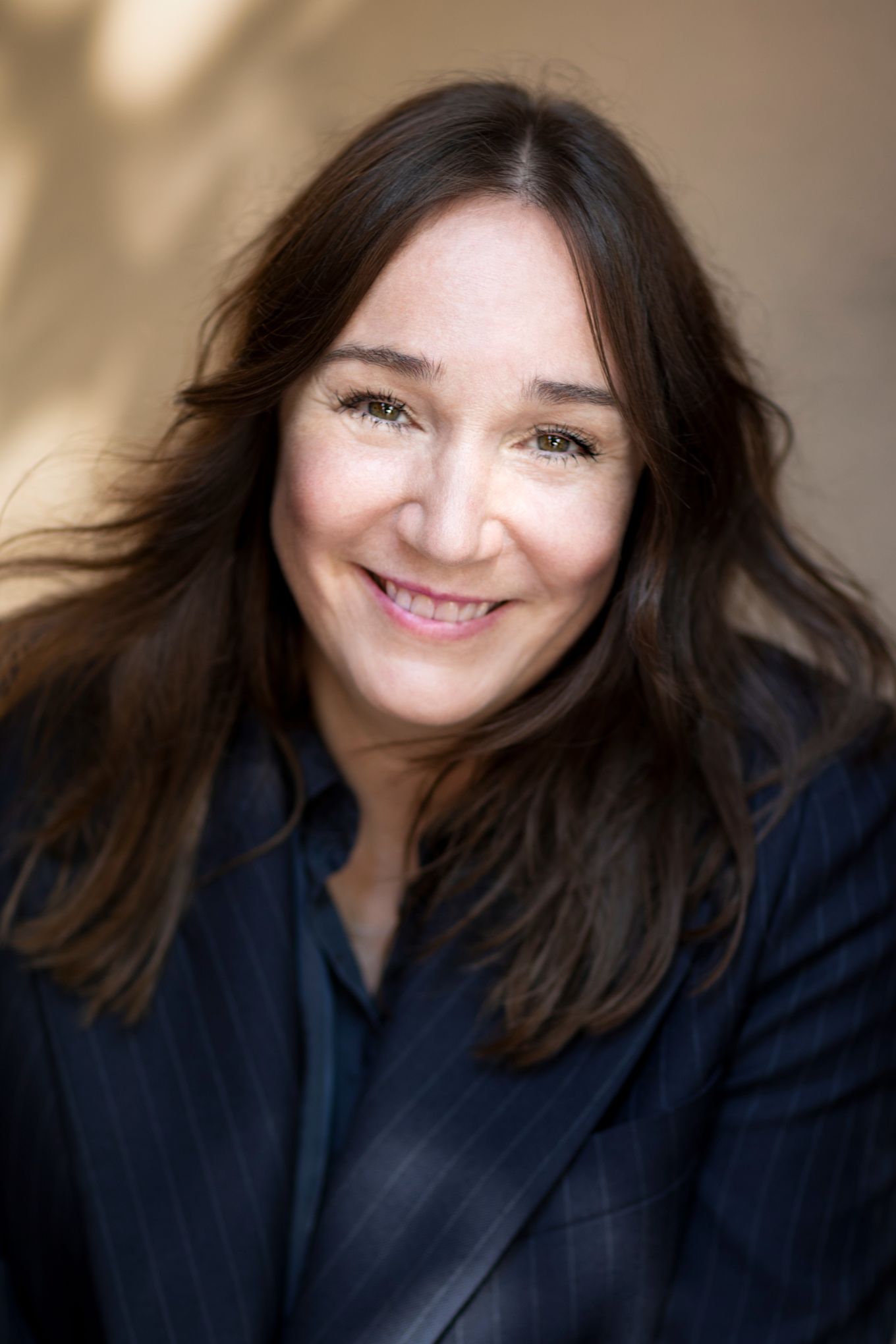 Portrait of Swedish designer Monica Förster smiling. Taken by Per Ranung.