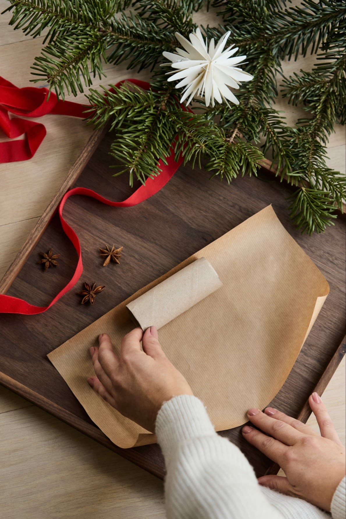 Step 1 in making your own Christmas cracker: Cut your paper into a rectangle roughly 30 x 20cm.