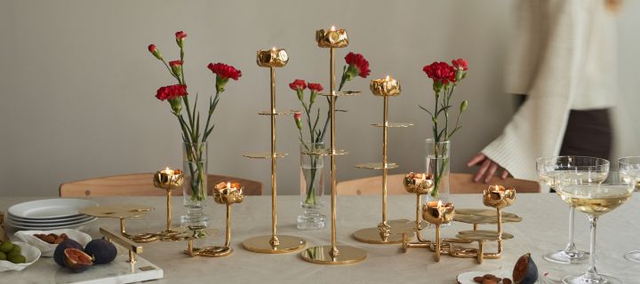 Set the table festively - with Hilke and the Ninfea Alta candle holders made of brass.