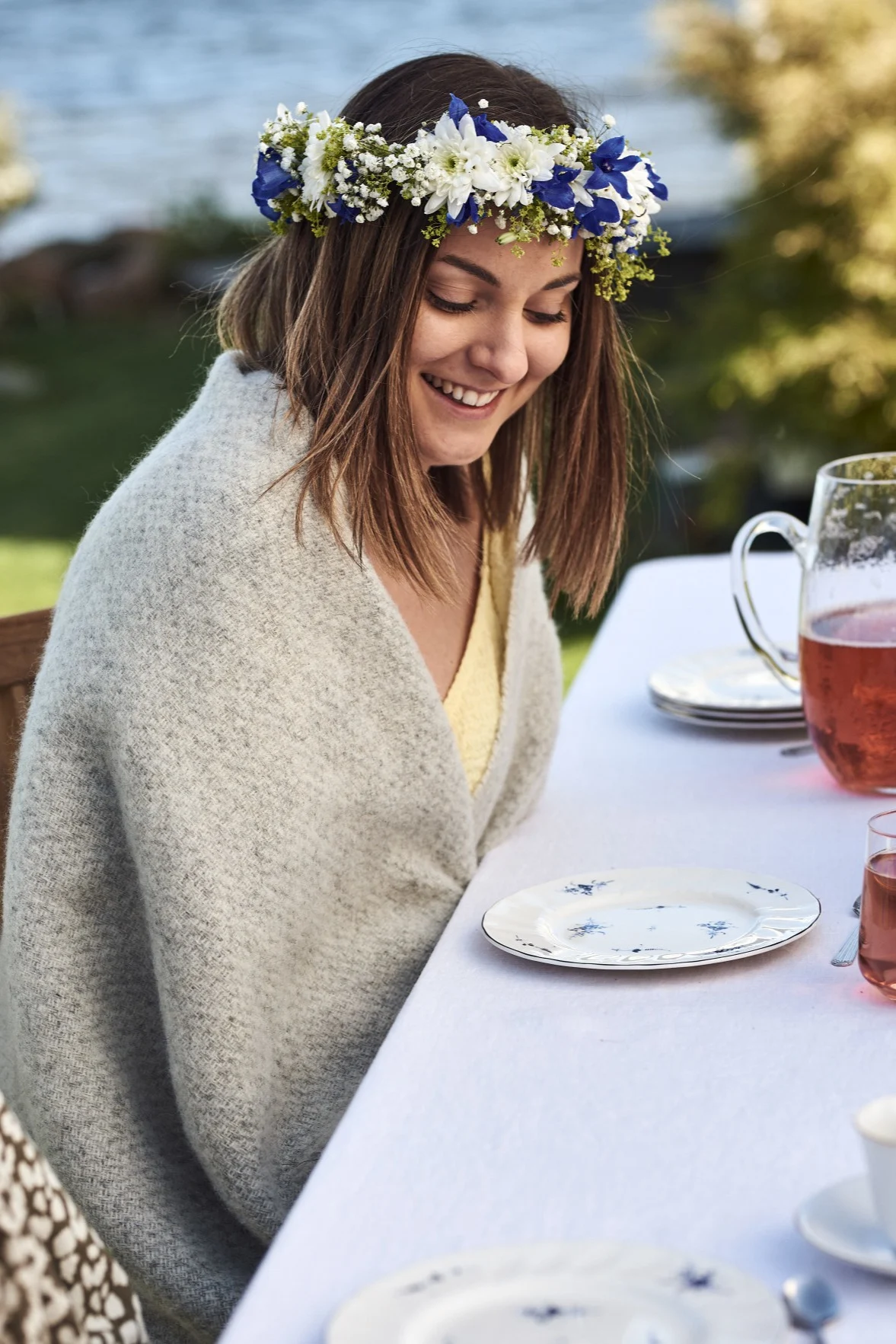 Discover Swedish midsummer party ideas like the midsummer flower crowns that you see here.