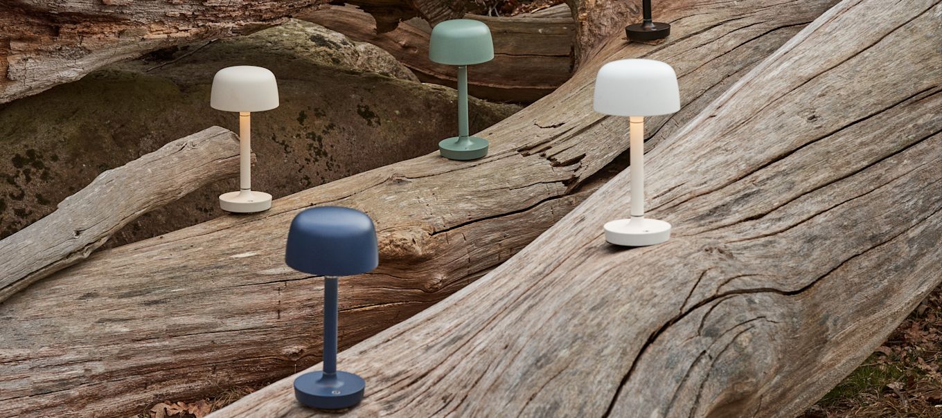 Decorate with rechargeable lamps outdoors to create a cosy patio or garden, here Halo portable lamp from Scandi Living in different colours.