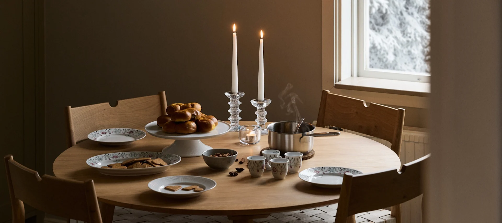 Create a cosy Christmas celebration with Swedish saffron buns and warming glögg.