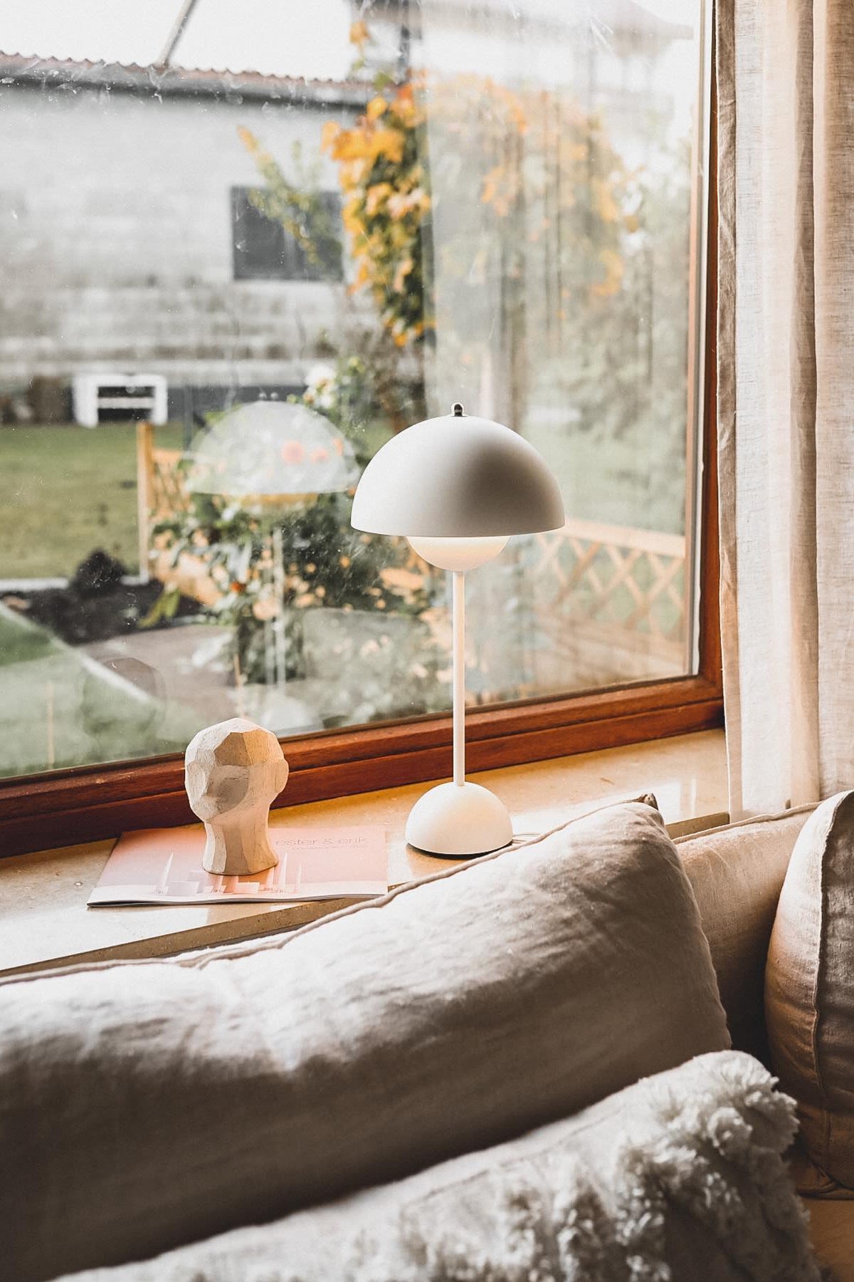 Decorate the windowsill with the Flowerpot table lamp from &tradition and a small sculpture such as the Olufemi from Cooee Design, just like @a.nnahawk.