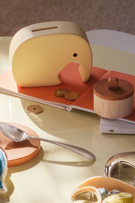 Money is also often a popular gift for a baby shower. Wrap it up cutely in the yellow Miniphant money box from Georg Jensen, which is both practical and decorative.