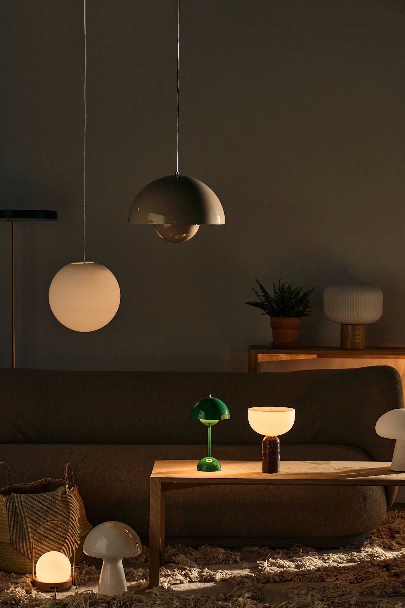 Image showing various lamps in the living room, including the Luna ceiling lamp, a white globe lamp from Design House Stockholm, and the Flowerpot ceiling lamp from &Tradition.