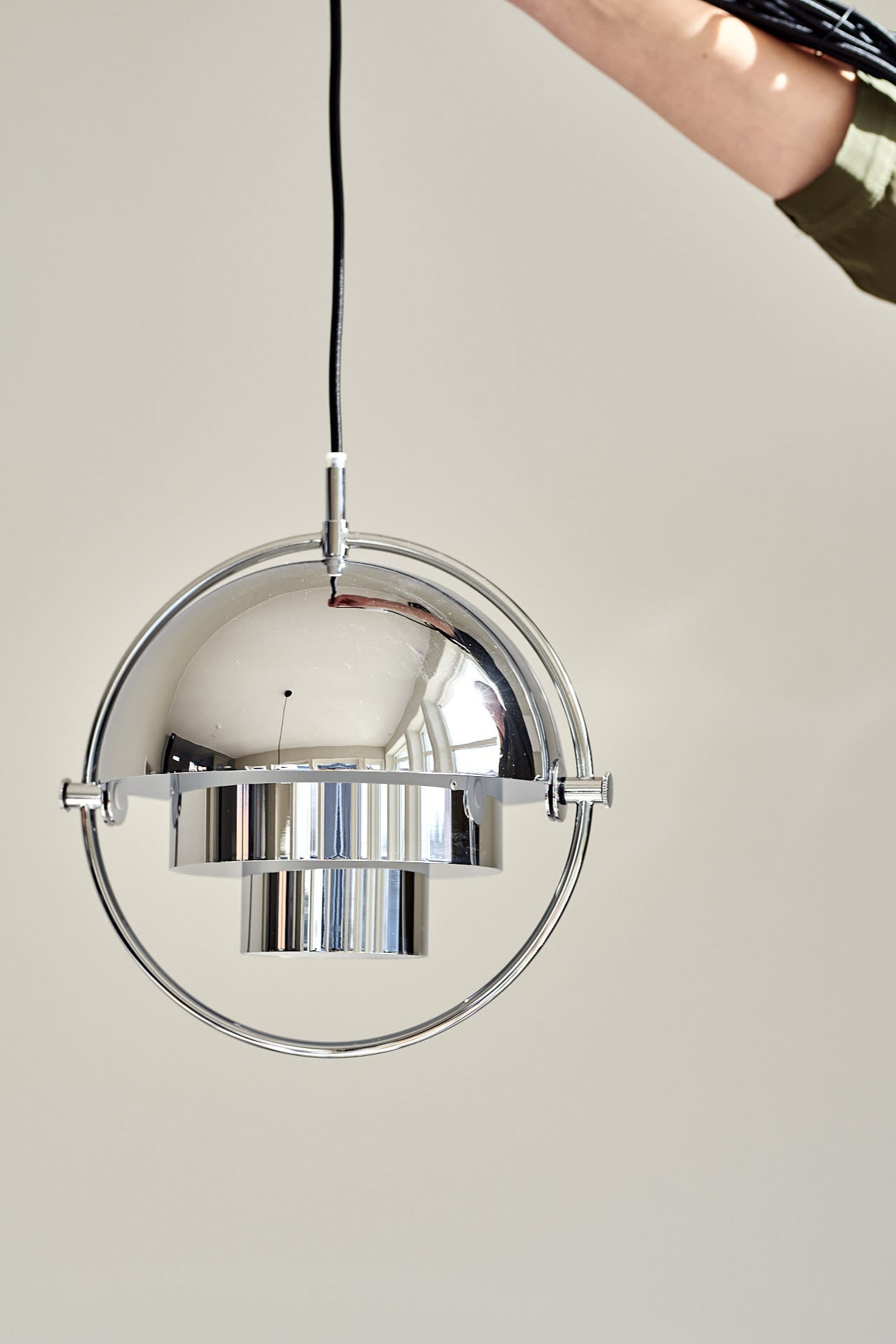 Multi-lite lamp from Gubi in chrome.