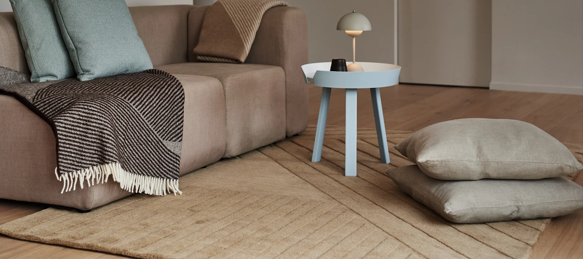 Levels wool rug Stripes beige from NJRD is a luxurious rug for the living in our guide to choosing the right rug.