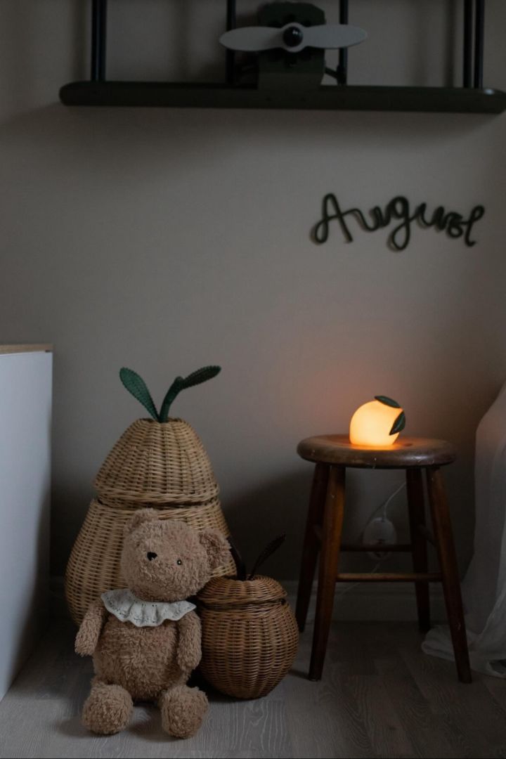 The Pear storage basket in wicker with the lemon lamp and a teddy from Ferm Living. Storage baskets make ideal baby shower gift ideas. 