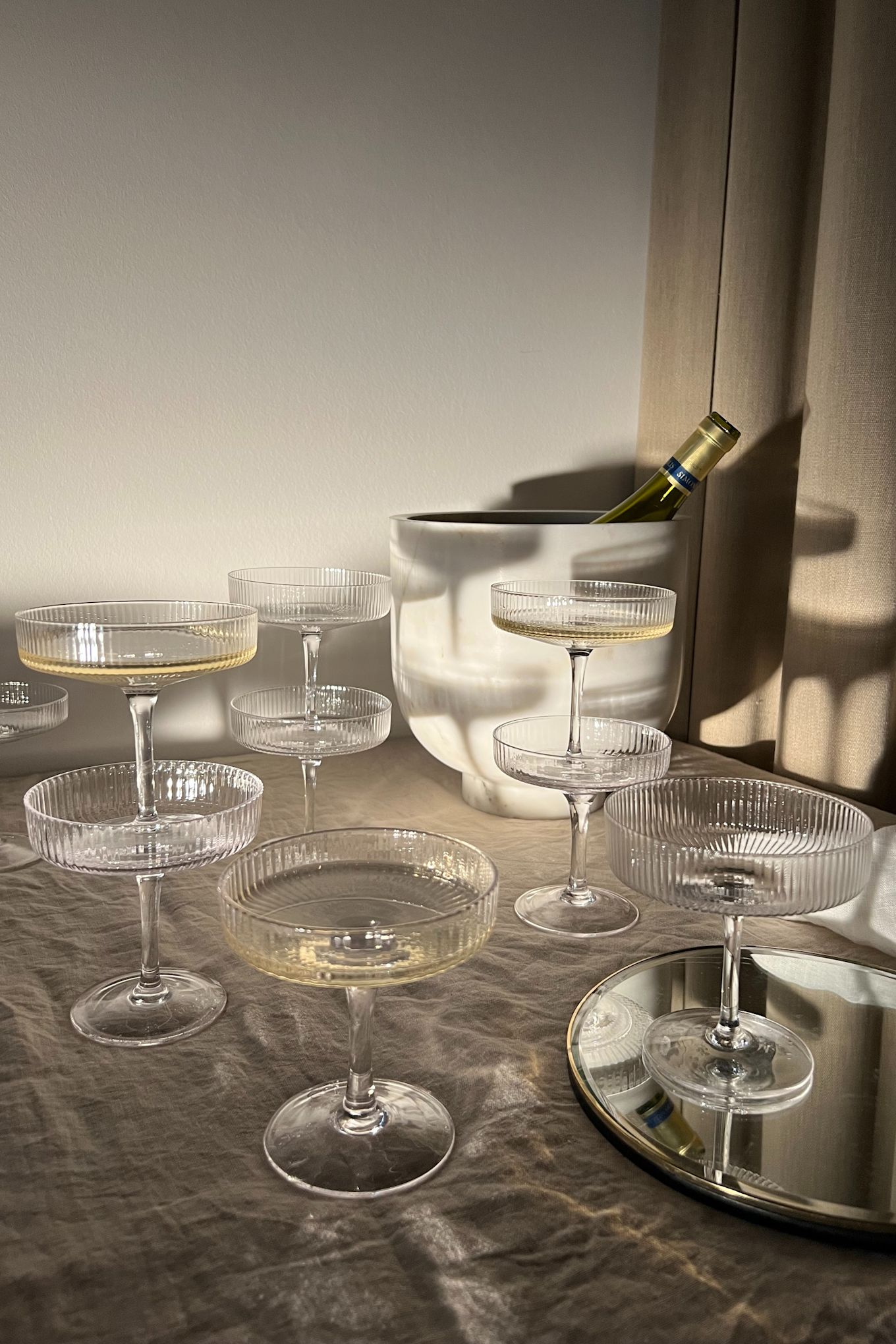 The Ripple champagne glasses from Ferm Living are a very popular gift idea for weddings, as they impress with their special shape and grooves.