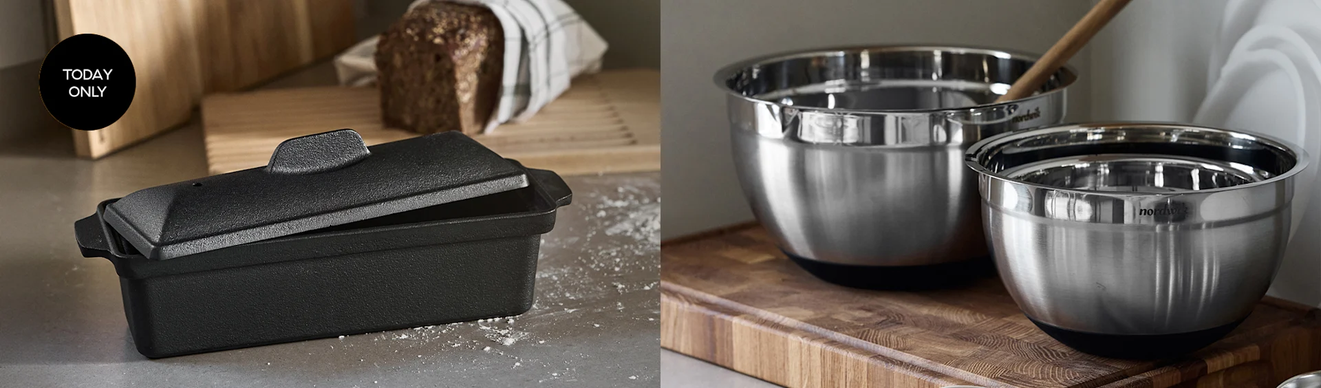 A black rectangular loaf pan with its lid slightly open, next to a rustic loaf of bread on a wooden board. A 'TODAY ONLY' tag is visible.