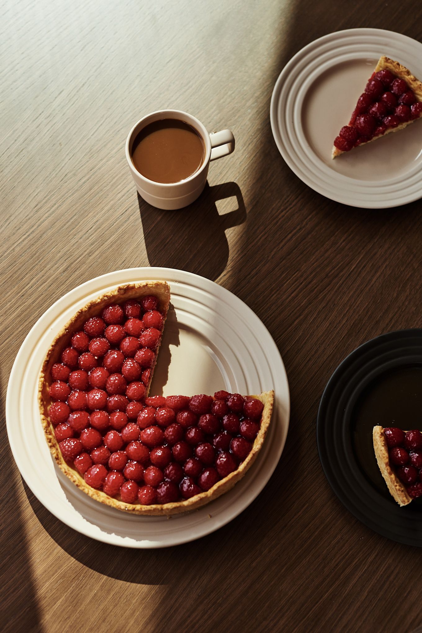 The NJRD lines plate in beige with a cherry pie and cup of coffee. 